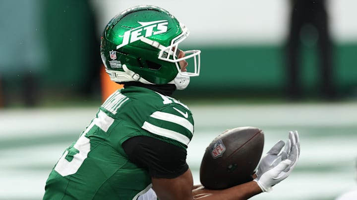 New York Jets wide receiver Adonai Mitchell (15) makes a touchdown catch against the Atlanta Falcons during the second half at MetLife Stadium. 