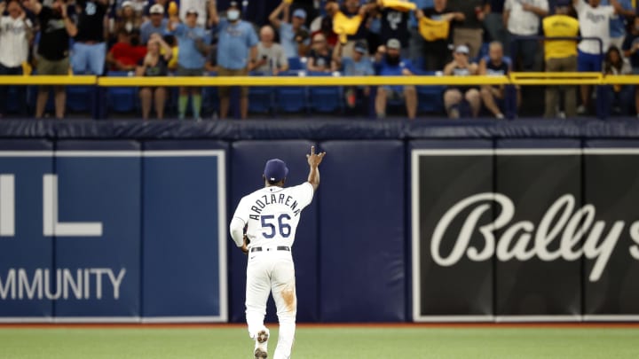 Oct 7, 2021; St. Petersburg, Florida, USA; Tampa Bay Rays right fielder Randy Arozarena (56) acknowledges fans after returning to the filed during the 6th inning of game one of the 2021 ALDS against the Boston Red Sox at Tropicana Field. Oct 7, 2021; St. Petersburg, Florida, USA; Tampa Bay Rays right fielder Randy Arozarena (56) acknowledges fans after returning to the filed during the 6th inning of game one of the 2021 ALDS against the Boston Red Sox at Tropicana Field.