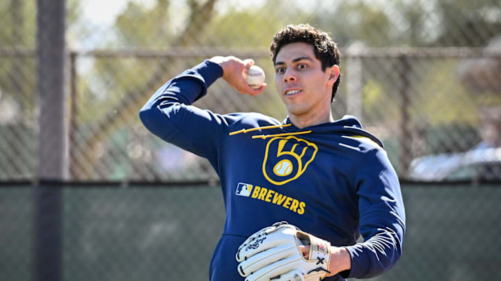 Milwaukee Brewers outfielder Christian Yelich throws during spring training workouts Saturday, February 15, 2025, at the American Family Fields of Phoenix in Phoenix, Arizona.
