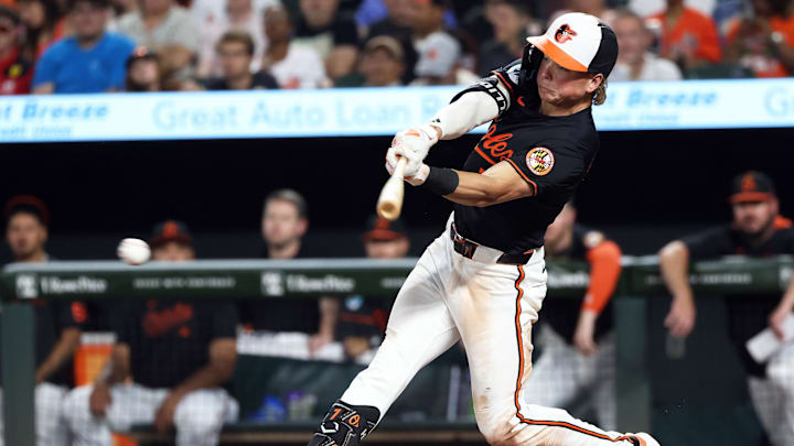 Baltimore Orioles second baseman Jackson Holliday (7) hits a single during the eighth inning against the Detroit Tigers at Oriole Park at Camden Yards on June 11.