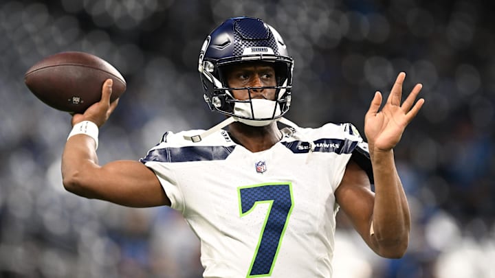 Sep 30, 2024; Detroit, Michigan, USA; Seattle Seahawks quarterback Geno Smith (7) throws passes during pregame warmups before their game against the Detroit Lions at Ford Field. Sep 30, 2024; Detroit, Michigan, USA; Seattle Seahawks quarterback Geno Smith (7) throws passes during pregame warmups before their game against the Detroit Lions at Ford Field.