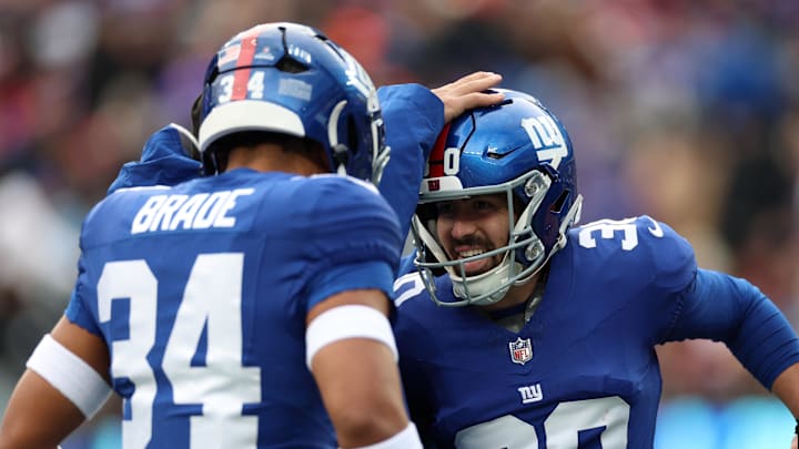 Dec 21, 2025; East Rutherford, New Jersey, USA; New York Giants kicker Ben Sauls (30) reacts against the Minnesota Vikings during the first half at MetLife Stadium.  