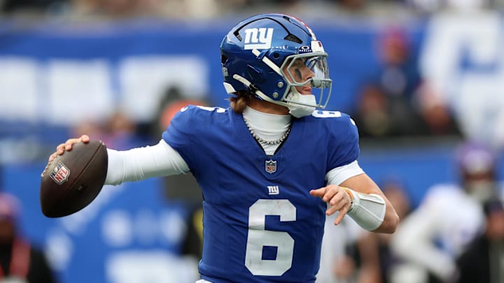 Dec 21, 2025; East Rutherford, New Jersey, USA; New York Giants quarterback Jaxson Dart (6) drops back to pass against the Minnesota Vikings during the second half at MetLife Stadium.