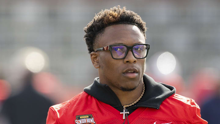 Jan 29, 2026; Mobile, AL, USA; National cornerback Colton Hood (27) of Tennessee walks the field during National Senior Bowl practice at Hancock Whitney Stadium.  