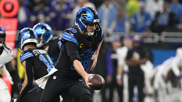 Jan 5, 2025; Detroit, Michigan, USA; Detroit Lions quarterback Jared Goff (16) hands the ball off to running back Jahmyr Gibbs (not pictured) against the Minnesota Vikings in the first quarter at Ford Field. Mandatory Credit: Lon Horwedel-Imagn Images