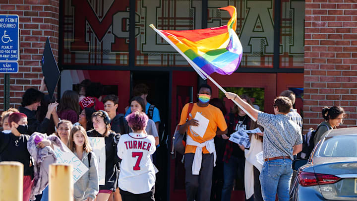 Sep 27, 2022; McLean, V.A., USA; McLean High School students walk out in protest of Gov. Glenn Youngkin's policy that would restrict the rights of transgender students. Nearly 100 schools across the state held walkouts throughout the day. Mandatory Credit: Josh Morgan-USA TODAY