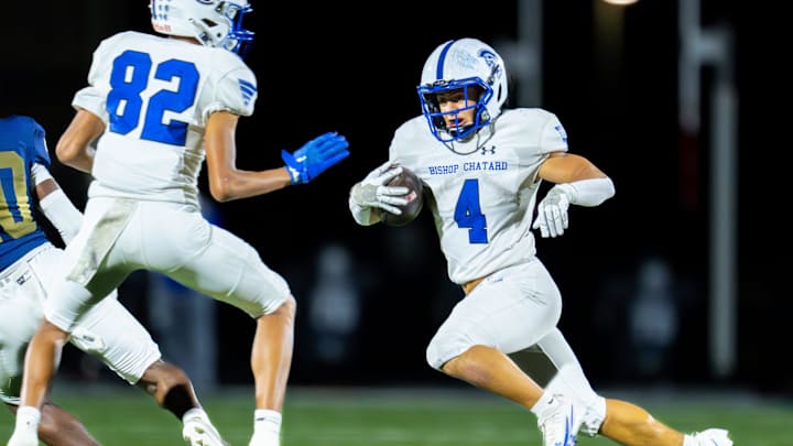 Bishop Chatard High School junior Danny Adams (4) runs the ball during the first half of an IHSAA varsity football game against Tri-West Hendricks High School, Friday, Oct. 10, 2025, at Tri-West Hendricks High School. Bishop Chatard High School junior Danny Adams (4) runs the ball during the first half of an IHSAA varsity football game against Tri-West Hendricks High School, Friday, Oct. 10, 2025, at Tri-West Hendricks High School.
