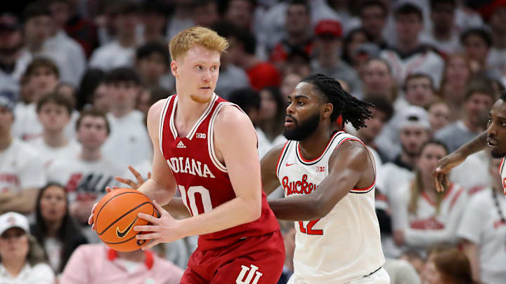 Indiana forward Luke Goode (10) looks to pass as Ohio State Buckeyes guard Evan Mahaffey (12) defends. Goode had a career-high 23 points — including the game-winner — in IU's overtime win. 