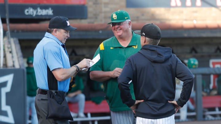Baylor coach Mitch Thompson and Texas Tech coach Tim Tadlock speak before game one of their Big 12 baseball game, Friday, April 21, 2023, at Dan Law Field at Rip Griffin Park.