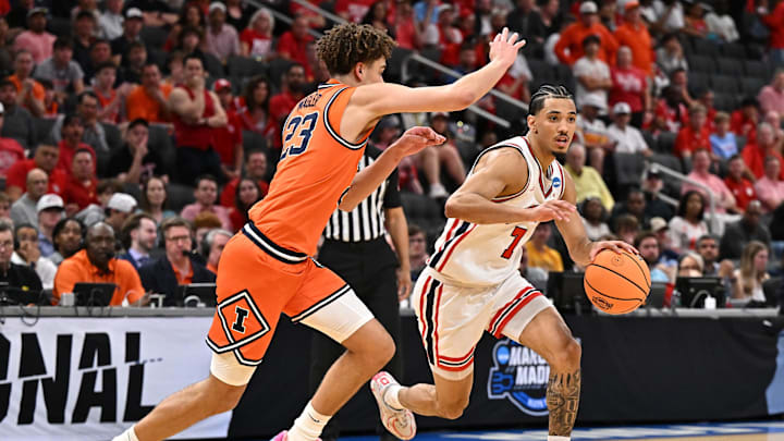 Mar 26, 2026; Houston, TX, USA; Houston Cougars guard Milos Uzan (7) dribbles the ball against the Illinois Fighting Illini in the first half during a Sweet Sixteen game of the South Regional of the men's 2026 NCAA Tournament at Toyota Center. Mandatory Credit: Maria Lysaker-Imagn Images Mar 26, 2026; Houston, TX, USA; Houston Cougars guard Milos Uzan (7) dribbles the ball against the Illinois Fighting Illini in the first half during a Sweet Sixteen game of the South Regional of the men's 2026 NCAA Tournament at Toyota Center. Mandatory Credit: Maria Lysaker-Imagn Images