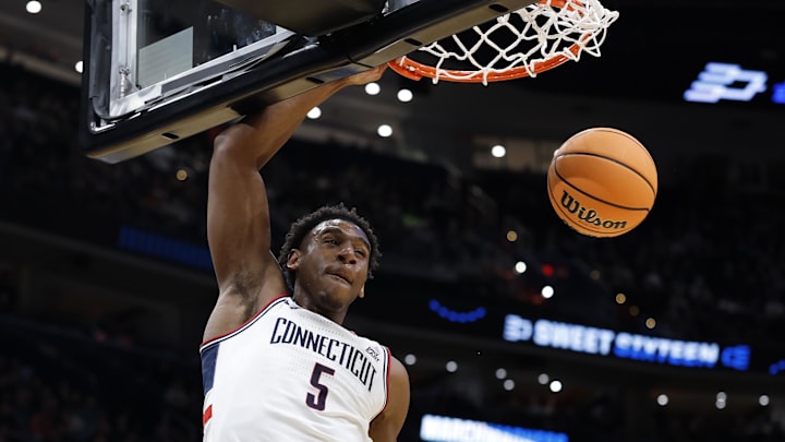 Mar 27, 2026; Washington, DC, USA;UConn Huskies forward Tarris Reed Jr. (5) dunks the ball against the Michigan State Spartans in the second half during a Sweet Sixteen game of the East Regional of the men's 2026 NCAA Tournament at Capital One Arena. Mandatory Credit: Amber Searls-Imagn Images Mar 27, 2026; Washington, DC, USA;UConn Huskies forward Tarris Reed Jr. (5) dunks the ball against the Michigan State Spartans in the second half during a Sweet Sixteen game of the East Regional of the men's 2026 NCAA Tournament at Capital One Arena. Mandatory Credit: Amber Searls-Imagn Images