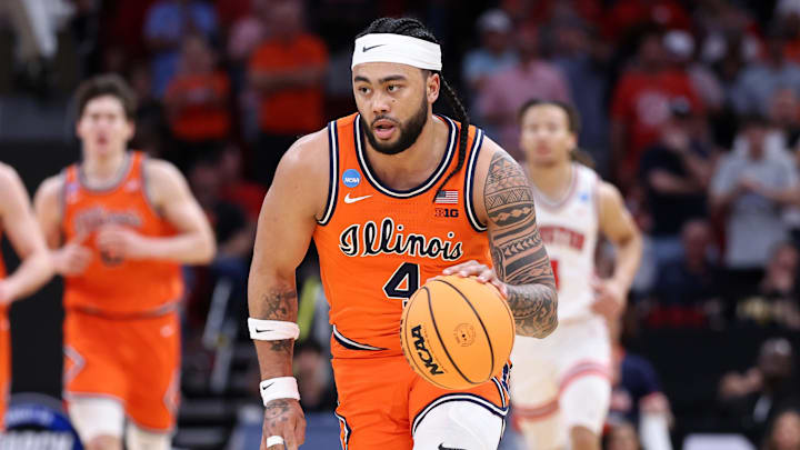 Mar 26, 2026; Houston, TX, USA; Illinois Fighting Illini guard Kylan Boswell (4) dribbles the ball against the Houston Cougars in the first half during a Sweet Sixteen game of the South Regional of the men's 2026 NCAA Tournament at Toyota Center. Mandatory Credit: Troy Taormina-Imagn Images
