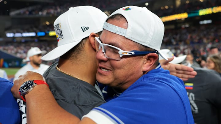 Venezuela manager Omar Lopez (22) reacts after defeating the United States during the 2026 World Baseball Classic Championship game at loanDepot Park. 