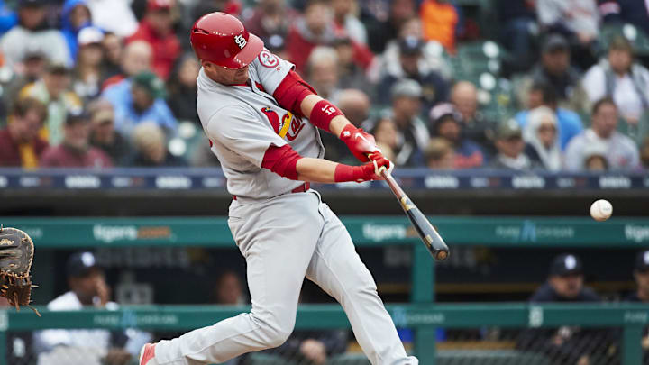 Sep 9, 2018; Detroit, MI, USA; St. Louis Cardinals catcher Carson Kelly (19) hits a single in the sixth inning against the Detroit Tigers at Comerica Park. Mandatory Credit: Rick Osentoski-Imagn Images