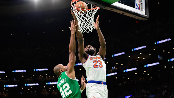 Dec 8, 2023; Boston, Massachusetts, USA; New York Knicks center Mitchell Robinson (23) shoots the ball over Boston Celtics center Al Horford (42) during the first half at TD Garden. Mandatory Credit: Eric Canha-Imagn Images Dec 8, 2023; Boston, Massachusetts, USA; New York Knicks center Mitchell Robinson (23) shoots the ball over Boston Celtics center Al Horford (42) during the first half at TD Garden. Mandatory Credit: Eric Canha-Imagn Images