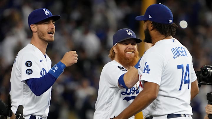 Oct 19, 2021; Los Angeles, California, USA; Los Angeles Dodgers first baseman Cody Bellinger (35), third baseman Justin Turner (10) and relief pitcher Kenley Jansen (74) celebrate after defeating the Atlanta Braves in game three of the 2021 NLCS at Dodger Stadium. The Dodgers won 6-5. Mandatory Credit: Kirby Lee-Imagn Images