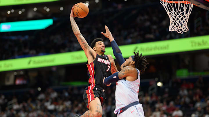Miami Heat rookie center Kel'el Ware soars over Washington Wizards forward Richaun Holmes in a lopsided win in D.C. to help his team close out March with a fifth straight victory. Miami Heat rookie center Kel'el Ware soars over Washington Wizards forward Richaun Holmes in a lopsided win in D.C. to help his team close out March with a fifth straight victory.