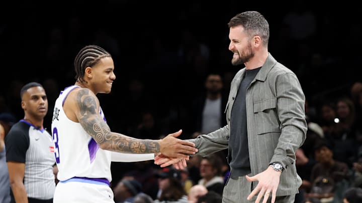 Dec 4, 2025; Brooklyn, New York, USA; Utah Jazz guard Keyonte George (3) reacts with forward Kevin Love (42) after a timeout against Brooklyn Nets during the fourth quarter at Barclays Center. Mandatory Credit: Tom Horak-Imagn Images