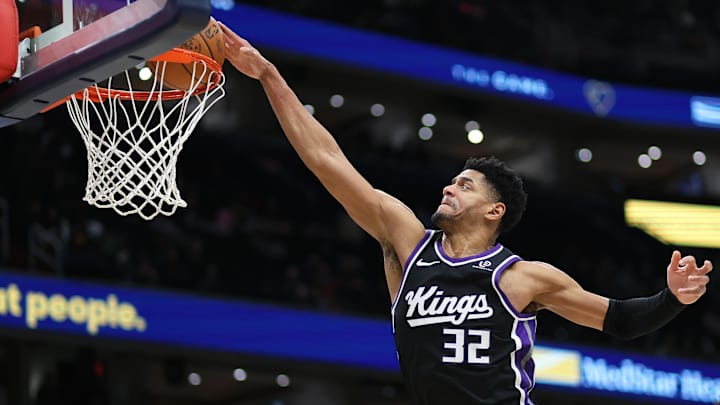Feb 1, 2026; Washington, District of Columbia, USA; Sacramento Kings center Dylan Cardwell (32) dunks during the second half against the Washington Wizards at Capital One Arena. Mandatory Credit: Daniel Kucin Jr.-Imagn Images