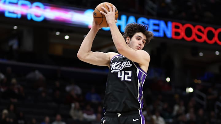 Feb 1, 2026; Washington, District of Columbia, USA; Sacramento Kings center Maxime Raynaud (42) grabs a rebound during the first half against the Washington Wizards at Capital One Arena. Mandatory Credit: Daniel Kucin Jr.-Imagn Images