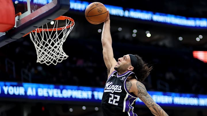 Feb 1, 2026; Washington, District of Columbia, USA; Sacramento Kings guard Devin Carter (22) dunks during the second half against the Washington Wizards at Capital One Arena. Mandatory Credit: Daniel Kucin Jr.-Imagn Images