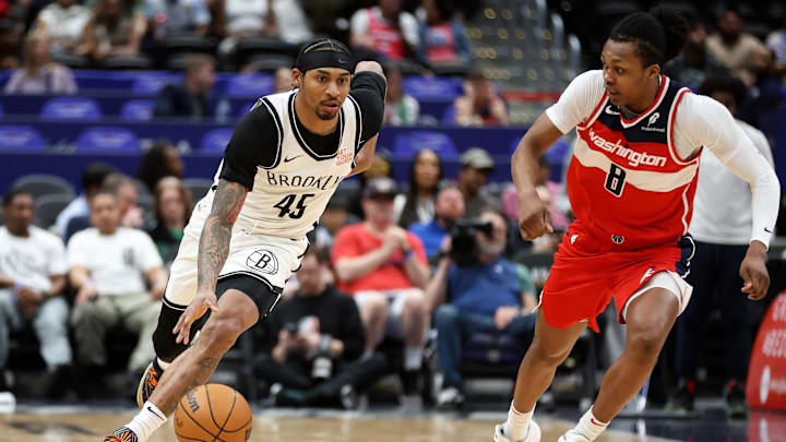 Mar 29, 2025; Washington, District of Columbia, USA; Brooklyn Nets guard Keon Johnson (45) drives past Washington Wizards guard Bub Carrington (8) during the first half at Capital One Arena. Mandatory Credit: Daniel Kucin Jr.-Imagn Images Mar 29, 2025; Washington, District of Columbia, USA; Brooklyn Nets guard Keon Johnson (45) drives past Washington Wizards guard Bub Carrington (8) during the first half at Capital One Arena. Mandatory Credit: Daniel Kucin Jr.-Imagn Images