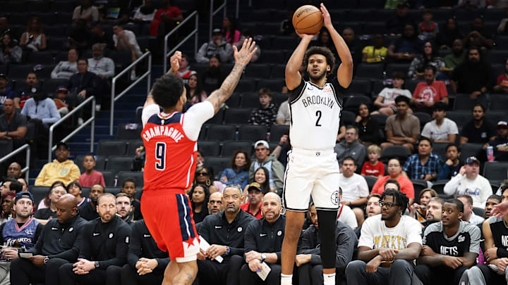 Mar 29, 2025; Washington, District of Columbia, USA; Brooklyn Nets forward Cameron Johnson (2) takes a shot over Washington Wizards forward Justin Champagnie (9) during the first half at Capital One Arena. Mandatory Credit: Daniel Kucin Jr.-Imagn Images