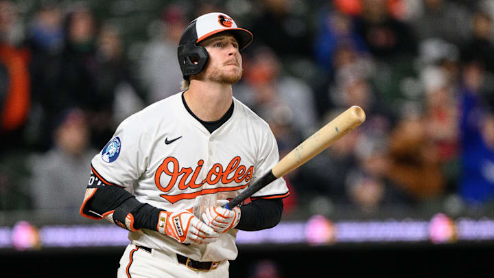 Apr 16, 2025; Baltimore, Maryland, USA; Baltimore Orioles first baseman Ryan O'Hearn (32) reacts while hitting a home run during the eighth inning against the Cleveland Guardians at Oriole Park at Camden Yards. 