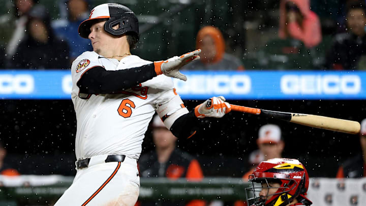 May 27, 2025; Baltimore, Maryland, USA; Baltimore Orioles first baseman Ryan Mountcastle (6) hits a single during the seventh inning against the St. Louis Cardinals at Oriole Park at Camden Yards.