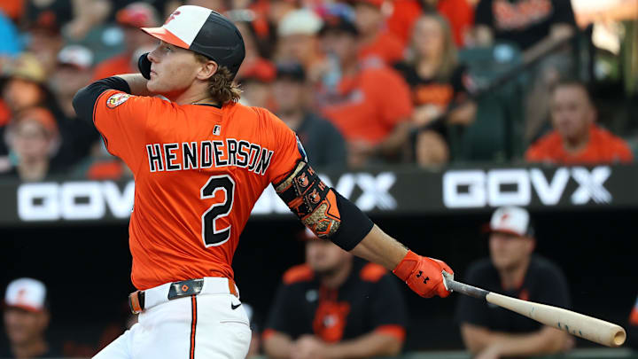 Aug 9, 2025; Baltimore, Maryland, USA; Baltimore Orioles shortstop Gunnar Henderson (2) hits a home run during the first inning against the Athletics at Oriole Park at Camden Yards. Aug 9, 2025; Baltimore, Maryland, USA; Baltimore Orioles shortstop Gunnar Henderson (2) hits a home run during the first inning against the Athletics at Oriole Park at Camden Yards.