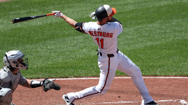 Aug 10, 2025; Baltimore, Maryland, USA; Baltimore Orioles third baseman Jordan Westburg (11) hits a home run during the fifth inning against the Athletics at Oriole Park at Camden Yards. Mandatory Credit: Daniel Kucin Jr.-Imagn Images