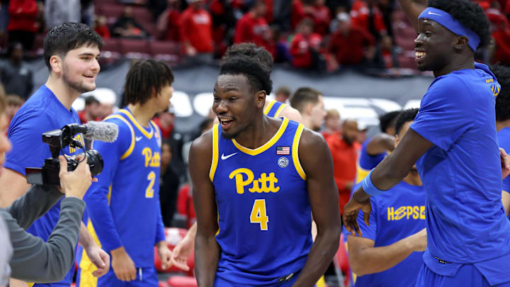 Nov 29, 2024; Columbus, Ohio, USA;  Pittsburgh Panthers forward Papa Amadou Kante (4) and teammates celebrate the overtime win at the buzzer against the Ohio State Buckeyes at Value City Arena. Mandatory Credit: Joseph Maiorana-Imagn Images