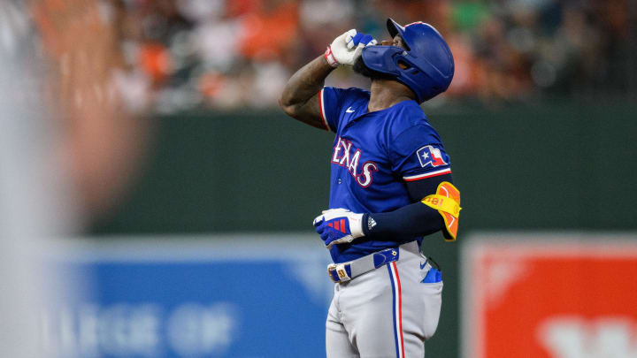 Jun 30, 2024; Baltimore, Maryland, USA; Texas Rangers outfielder Adolis García (53) reacts after hitting a double during the fifth inning against the Baltimore Orioles at Oriole Park at Camden Yards. Mandatory Credit: Reggie Hildred-USA TODAY Sports