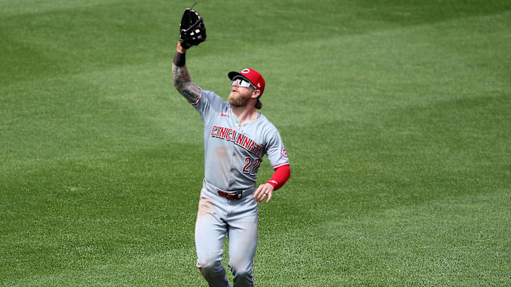 Apr 20, 2025; Baltimore, Maryland, USA; Cincinnati Reds outfielder Jake Fraley (27) makes a catch for an out during the fourth inning against the Baltimore Orioles at Oriole Park at Camden Yards. Mandatory Credit: Daniel Kucin Jr.-Imagn Images