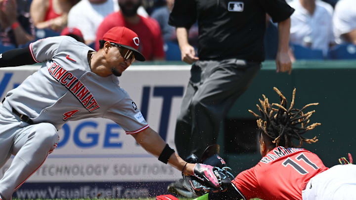 Jun 11, 2025; Cleveland, Ohio, USA; Cleveland Guardians third baseman Jose Ramirez (11) steals third base under the tag of Cincinnati Reds third baseman Santiago Espinal (4) during the first inning at Progressive Field. Mandatory Credit: Ken Blaze-Imagn Images