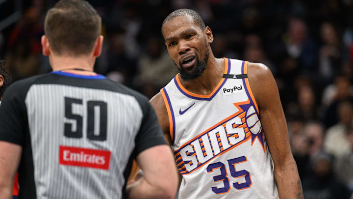 Jan 16, 2025; Washington, District of Columbia, USA; Phoenix Suns forward Kevin Durant (35) reacts to a foul call by referee Gediminas Petraitis (50) during the third quarter against the Washington Wizards at Capital One Arena. Mandatory Credit: Reggie Hildred-Imagn Images