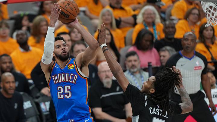 May 22, 2026; San Antonio, Texas, USA; Oklahoma City Thunder guard Ajay Mitchell (25) shoots the ball over San Antonio Spurs guard Stephon Castle (5) in the first half during game three of the western conference finals for the 2026 NBA playoffs at Frost Bank Center. Mandatory Credit: Daniel Dunn-Imagn Images May 22, 2026; San Antonio, Texas, USA; Oklahoma City Thunder guard Ajay Mitchell (25) shoots the ball over San Antonio Spurs guard Stephon Castle (5) in the first half during game three of the western conference finals for the 2026 NBA playoffs at Frost Bank Center. Mandatory Credit: Daniel Dunn-Imagn Images