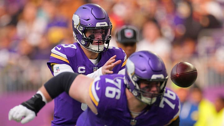 Dec 7, 2025; Minneapolis, Minnesota, USA; Minnesota Vikings quarterback J.J. McCarthy (9) takes the snap against the Washington Commanders during the first half at U.S. Bank Stadium. Mandatory Credit: Brad Rempel-Imagn Images