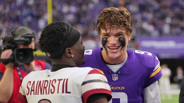 Dec 7, 2025; Minneapolis, Minnesota, USA; Minnesota Vikings quarterback J.J. McCarthy (9) reacts with Washington Commanders cornerback Mike Sainristil (0) after the game at U.S. Bank Stadium. Mandatory Credit: Brad Rempel-Imagn Images Dec 7, 2025; Minneapolis, Minnesota, USA; Minnesota Vikings quarterback J.J. McCarthy (9) reacts with Washington Commanders cornerback Mike Sainristil (0) after the game at U.S. Bank Stadium. Mandatory Credit: Brad Rempel-Imagn Images
