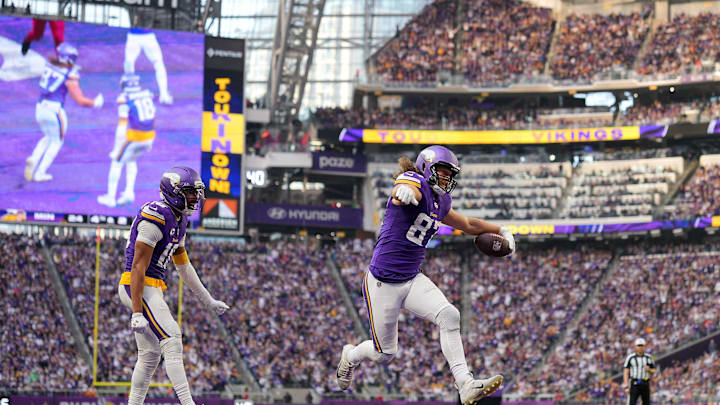 Dec 7, 2025; Minneapolis, Minnesota, USA; Minnesota Vikings tight end T.J. Hockenson (87) reacts after scoring a touchdown against the Washington Commanders during the second half at U.S. Bank Stadium. Mandatory Credit: Brad Rempel-Imagn Images