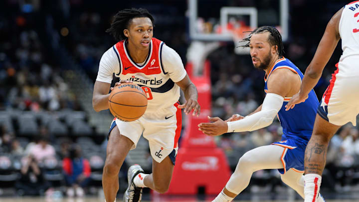 Oct 18, 2024; Washington, District of Columbia, USA; Washington Wizards guard Bub Carrington (8) drives to the basket against New York Knicks guard Jalen Brunson (11) during the third quarter at Capital One Arena. Mandatory Credit: Reggie Hildred-Imagn Images