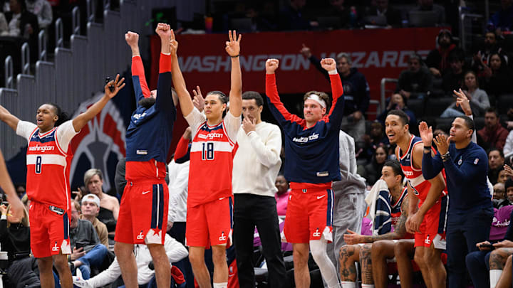 Jan 1, 2025; Washington, District of Columbia, USA; Washington Wizards bench celebrates during the fourth quarter against the Chicago Bulls at Capital One Arena. Mandatory Credit: Reggie Hildred-Imagn Images