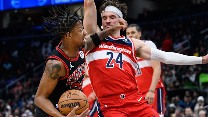 Jan 1, 2025; Washington, District of Columbia, USA; Chicago Bulls forward Dalen Terry (25) drives to the basket against Washington Wizards forward Corey Kispert (24) during the third quarter at Capital One Arena. Mandatory Credit: Reggie Hildred-Imagn Images Jan 1, 2025; Washington, District of Columbia, USA; Chicago Bulls forward Dalen Terry (25) drives to the basket against Washington Wizards forward Corey Kispert (24) during the third quarter at Capital One Arena. Mandatory Credit: Reggie Hildred-Imagn Images