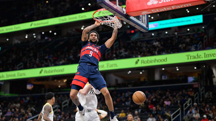 Mar 5, 2025; Washington, District of Columbia, USA; Washington Wizards forward Justin Champagnie (9) dunks the ball during the second quarter against the Utah Jazz at Capital One Arena. Mandatory Credit: Reggie Hildred-Imagn Images