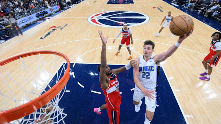 Mar 21, 2025; Washington, District of Columbia, USA; Orlando Magic forward Franz Wagner (22) takes a shot over Washington Wizards forward Alex Sarr (20) during the third quarter at Capital One Arena. Mandatory Credit: Reggie Hildred-Imagn Images Mar 21, 2025; Washington, District of Columbia, USA; Orlando Magic forward Franz Wagner (22) takes a shot over Washington Wizards forward Alex Sarr (20) during the third quarter at Capital One Arena. Mandatory Credit: Reggie Hildred-Imagn Images