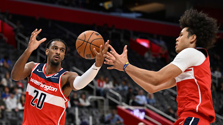 Oct 16, 2025; Detroit, Michigan, USA; Washington Wizards center Alex Sarr (20) and forward Kyshawn George (18) go for a rebound against the Detroit Pistons in the first quarter at Little Caesars Arena. Mandatory Credit: Lon Horwedel-Imagn Images Oct 16, 2025; Detroit, Michigan, USA; Washington Wizards center Alex Sarr (20) and forward Kyshawn George (18) go for a rebound against the Detroit Pistons in the first quarter at Little Caesars Arena. Mandatory Credit: Lon Horwedel-Imagn Images