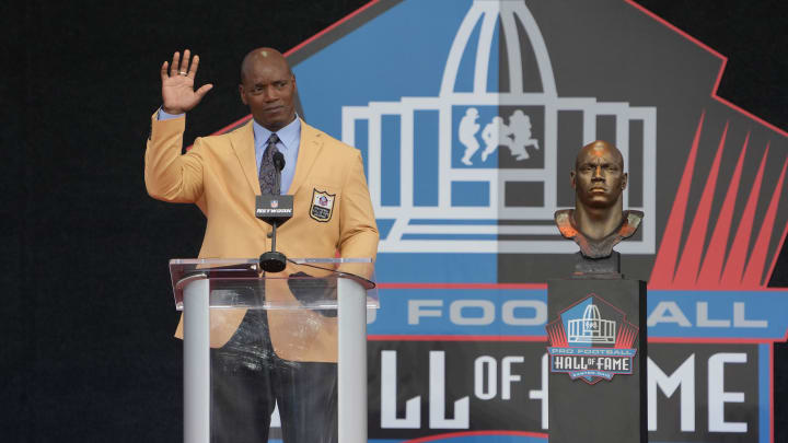 Aug 6, 2022; Canton, OH, USA; Bryant Young speaks during the Pro Football Hall of Fame Class of 2022 enshrinement ceremony at Tom Benson Hall of Fame Stadium. Aug 6, 2022; Canton, OH, USA; Bryant Young speaks during the Pro Football Hall of Fame Class of 2022 enshrinement ceremony at Tom Benson Hall of Fame Stadium.