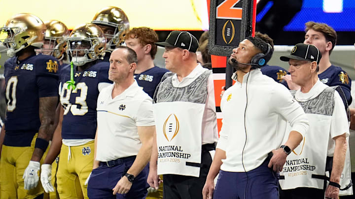 Notre Dame Fighting Irish head coach Marcus Freeman watches a replay in the second quarter against Ohio State Buckeyes during the College Football Playoff National Championship at Mercedes-Benz Stadium in Atlanta on January 20, 2025.