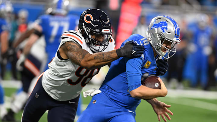 Nov 19, 2023; Detroit, Michigan, USA; Detroit Lions quarterback Jared Goff (16) is sacked by Chicago Bears defensive end Montez Sweat (98) in the fourth quarter at Ford Field. Mandatory Credit: Lon Horwedel-Imagn Images