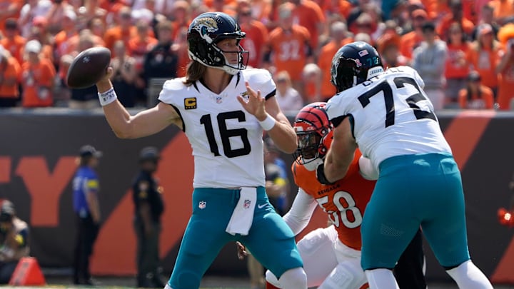 Jacksonville Jaguars quarterback Trevor Lawrence (16) looks to make a throw over the Cincinnati Bengals and Jacksonville Jaguars at Paycor Stadium on Sunday, September 14, 2025. Jacksonville Jaguars quarterback Trevor Lawrence (16) looks to make a throw over the Cincinnati Bengals and Jacksonville Jaguars at Paycor Stadium on Sunday, September 14, 2025.